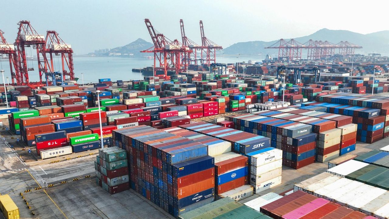 This aerial photo taken on November 7, 2022 shows containers stacked at a port in Lianyungang in China's eastern Jiangsu province. (Photo by AFP) / China OUT